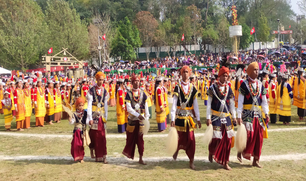 Thousands of youths in traditional attire take part in the three-day annual Shad Suk Mynsiem at Madan Weiking, organised by Seng Khasi Kmie Mawkhar in Shillong, as large crowds from the Khasi and Jaintia communities witness the thanksgiving dance on April 13, 2026. (Pix: UB Photos)
